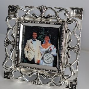 A Set of Silver Photo Frames
